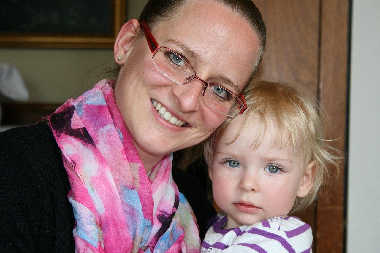 mother, child, recovered, protection, security, family, community, before, future, happy