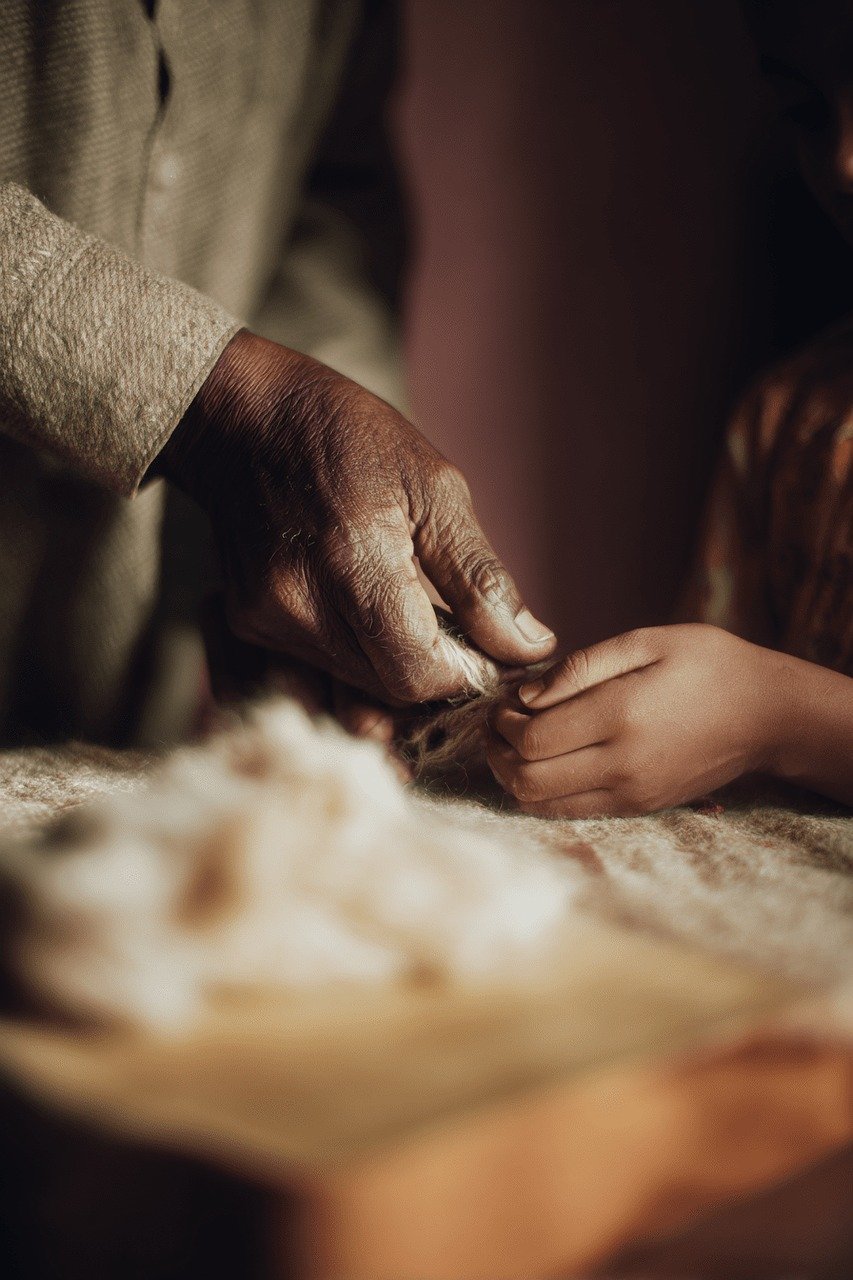 tradition, connection, children, grandparents, handmade, craft, learning, cooperation, heritage, bond, community, joy, love, warmth, learn something new, social activity, knowledge transfer, childhood memories, storytelling, authenticity
